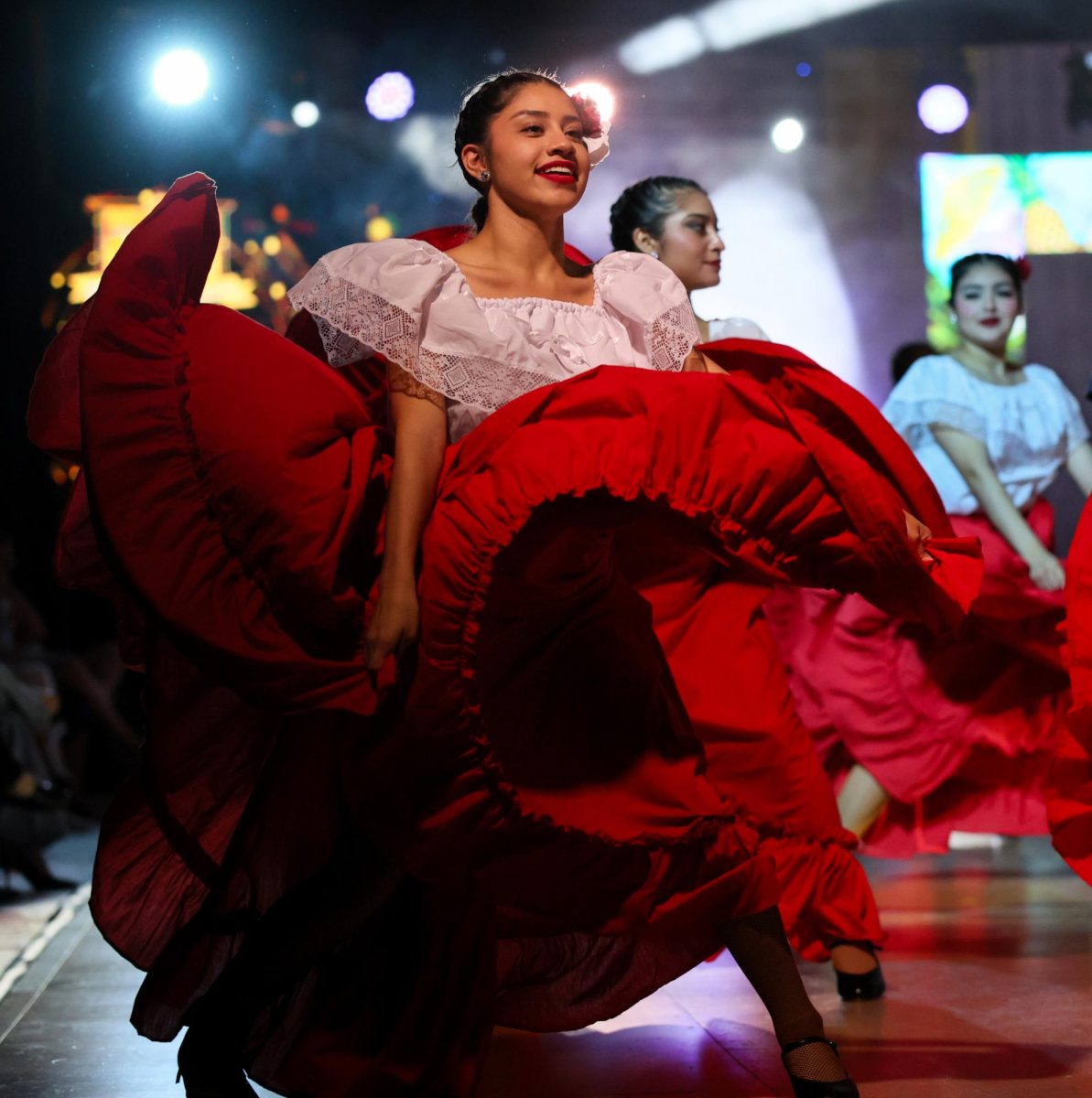 SWAY AWAY. Senior Stacy Balderas swaying her folklorico skirt to the song El Toro Mambo as she dances on Sept. 11, 2025. The style of this dance originated in Sinaloa, Mexico. “At first, it’s like all of the nerves rush to you but as soon as you step foot on the stage it’s like everything goes away and like that’s the only thing that matters,” Balderas said.