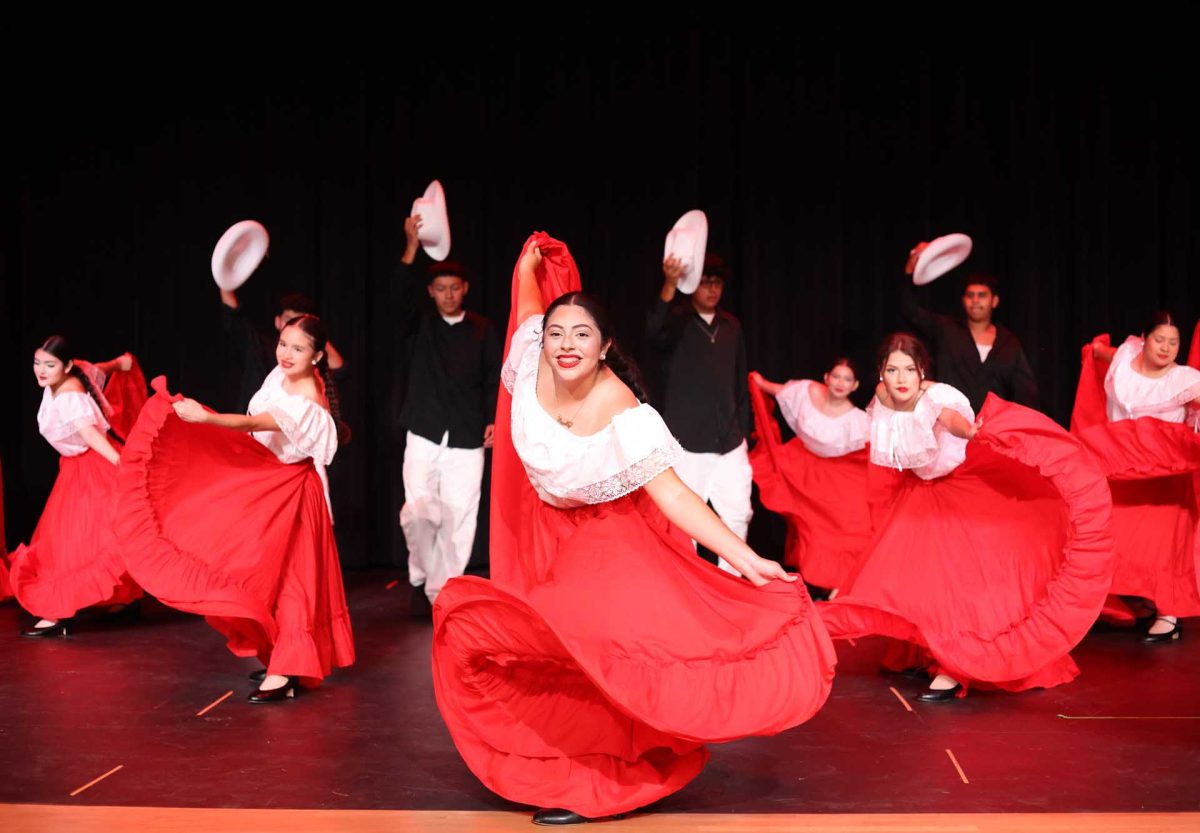 POSE! Senior Jacqueline Arteaga and other Panteras en Fuego dancers strike their final pose after their Hispanic Heritage Month performance on Tuesday, Oct. 14, 2025. The group’s lively folklórico number brought cheers from the Moorhead Jr. High students. “We definitely had the energy, especially for our folklórico dance because it’s basically made to hype people up,” Arteaga said.