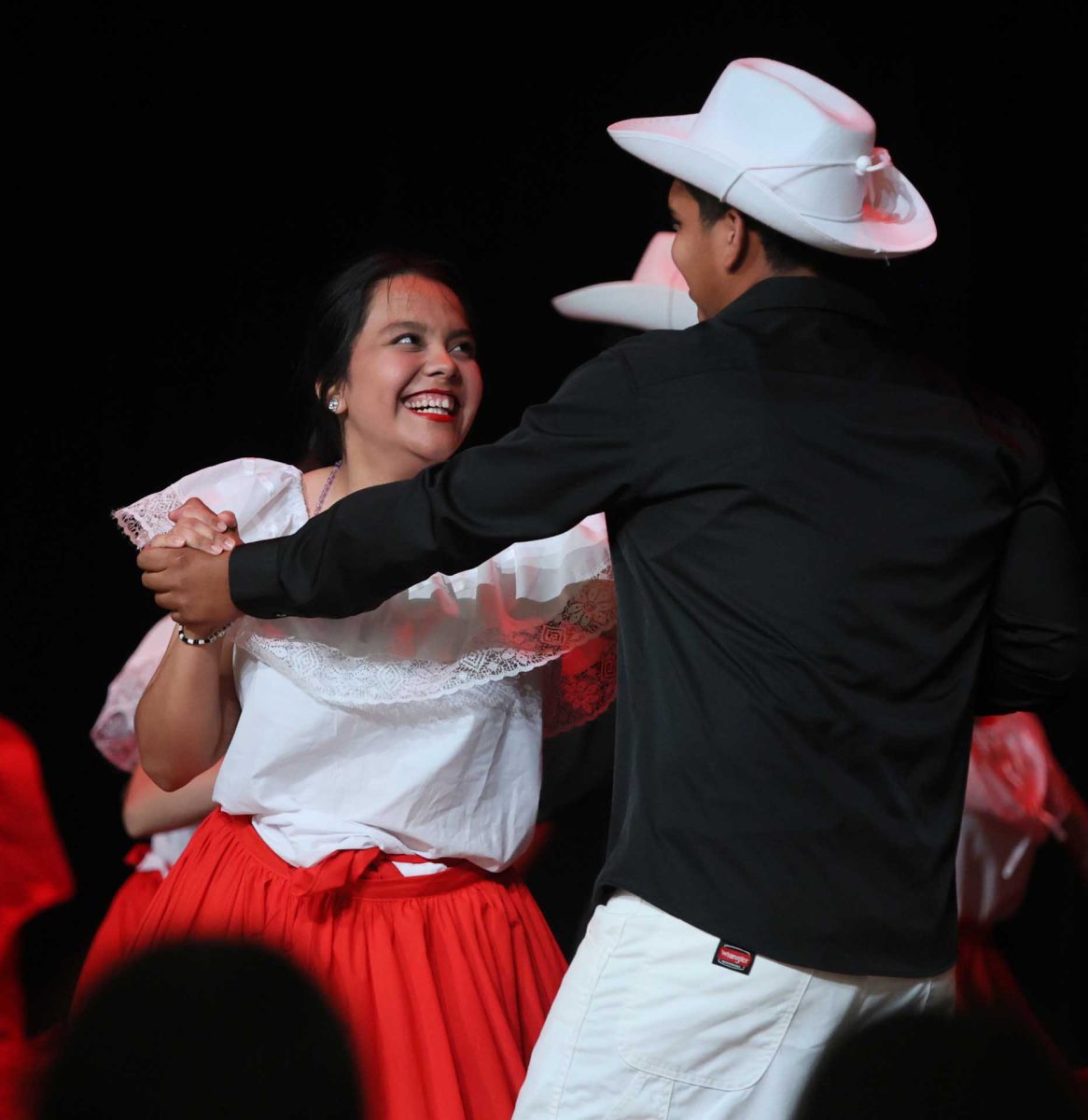 SWEET MISTAKE. Senior Vianney Olvera dancing with her dance partner as they laugh after forgetting a small part of the choreography on Oct. 14, 2025 at Moorhead Junior High. Her and her dance partner are also partners outside of dancing, making this a more bittersweet moment.