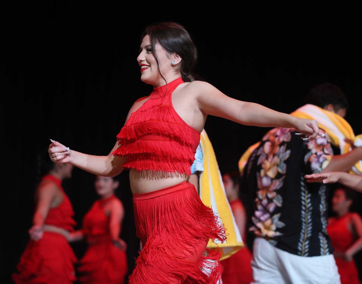 RHYTHM. Senior Dayanara Jaimes moving her hips as all of the other girls on the dance team form a circle to dance in a circle around the guys on Oct. 14, 2025 at Moorhead Junior High.