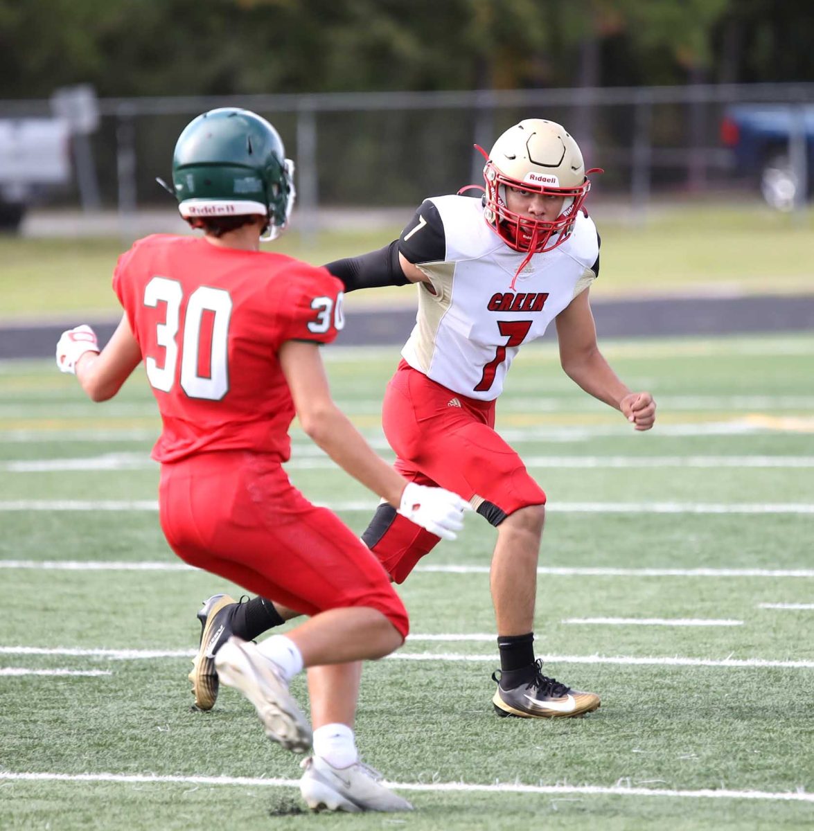 FAST. Freshman Aiden Rodriguez cuts towards his opponent to block him while on defense on Sept 24, 2025. Rodriquez makes a block on his opponent making it easier for our team to make a stop.