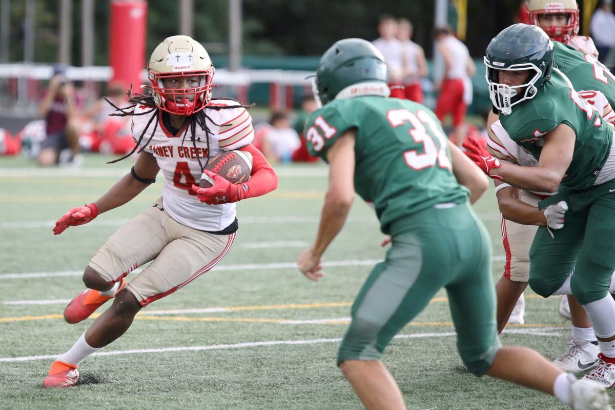 TOUGH PUSH. Freshman Marcus Miller was trying to run through his opponents on Sept, 24, 2025. Miller got 5-10 yards on this play after he got around the opponents. “All I was trying to do was try my best to get a touchdown,” Miller said.