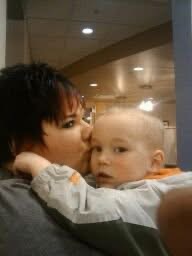 Mary Loveless-Day holds 3-year-old Logan Day in her arms. Photo was collected from Facebook.