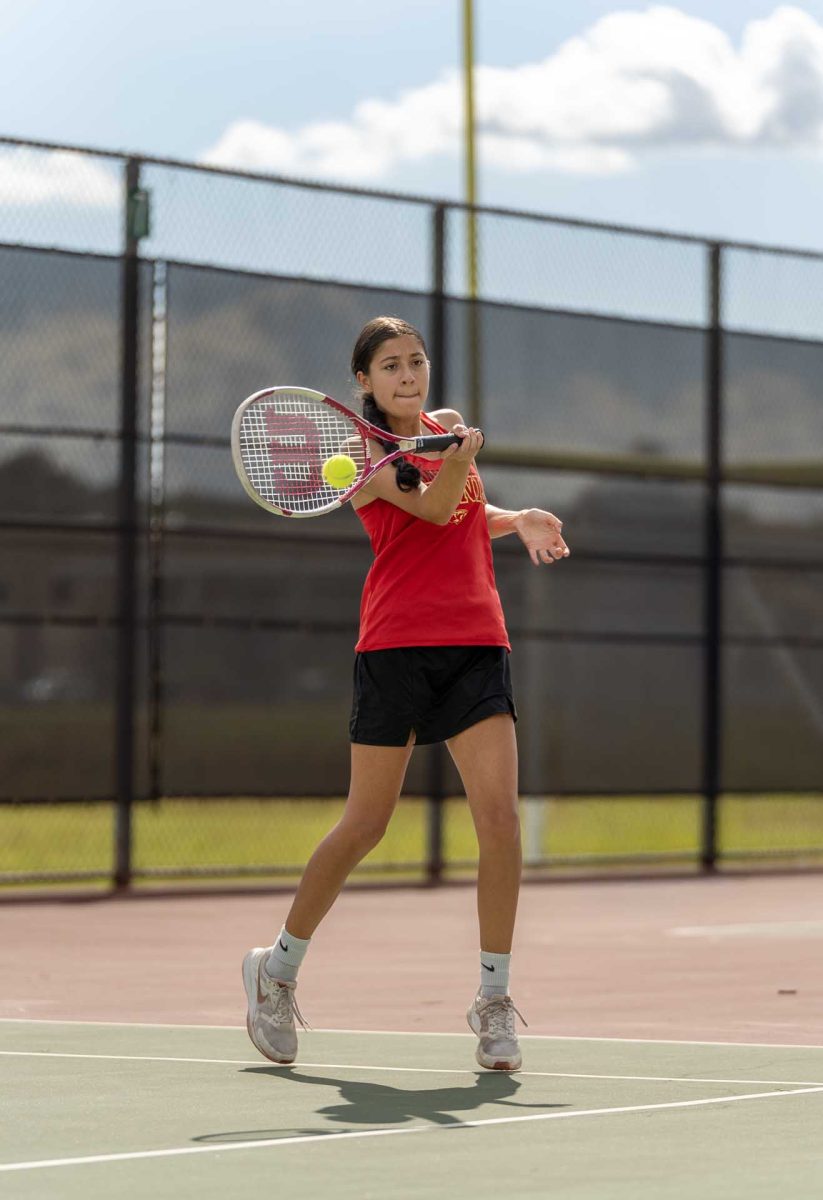 WHAMMY. Junior Sian Ashworth
in position to start the match feeling confident on Thursday, Sept. 23, 2025. Ashworth has been working hard this season to get more comfortable during tough matches. 