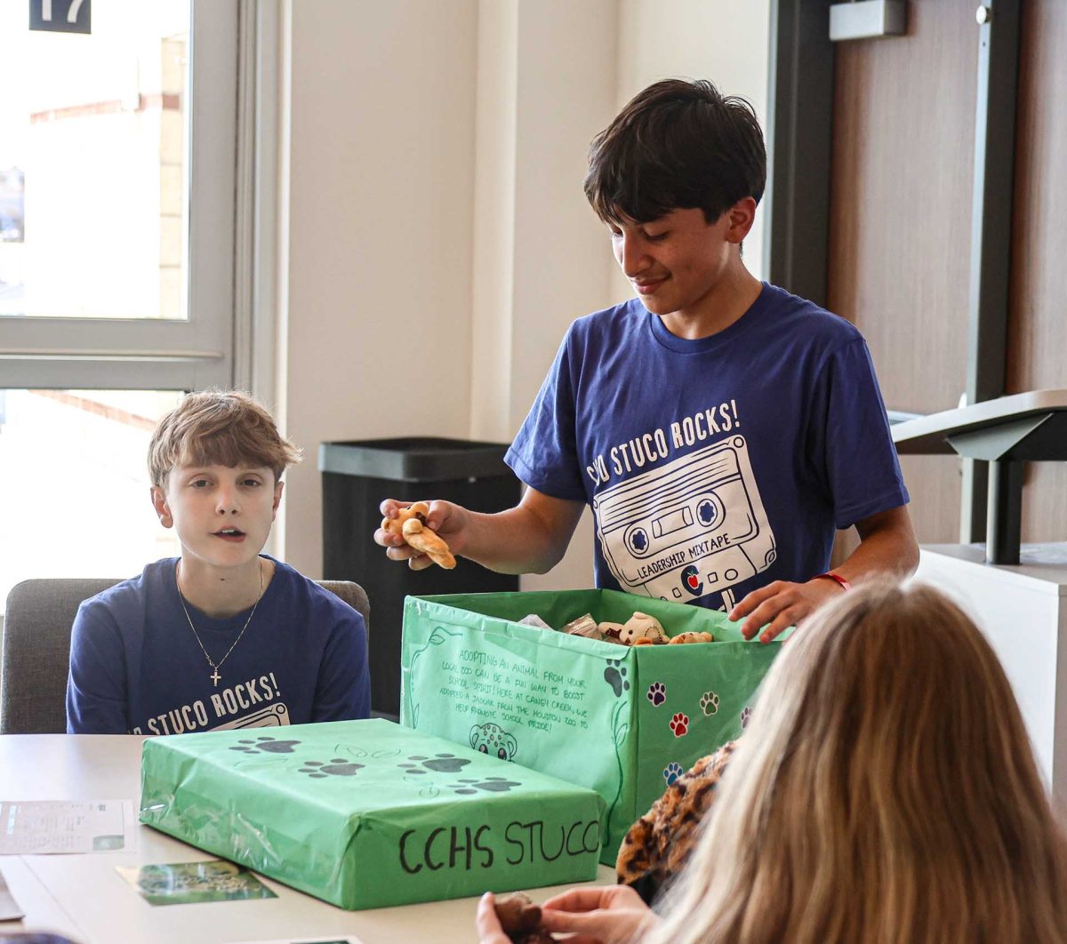 REPRESENT. Junior Gabriel Barcenas handed out small stuffed animals to the middle school students during the Mid-level conference that was held on Monday, Feb. 9, 2026. Every high school had three students running different small conferences, for Barcenas it was “Adopting an animal.” 