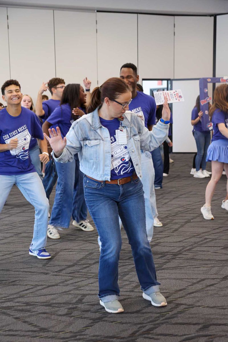 GET IT DOWN. Assistant Principal Dr.Karen Bray danced to “Footloose” during the Mid-Level conference on Monday, Feb. 9, 2026. The student council sponsors decided to put music to dance as a group to make a “Ice breaker” and help the middle school student council members loosen up. 