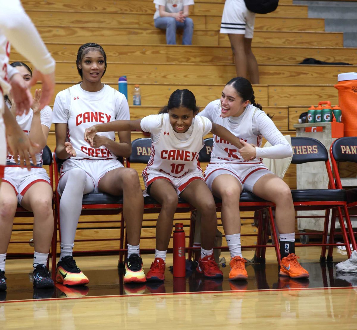 STARTING 5. Junior Brianna McBride gets ready to go high five everyone after her name gets called for starting 5 against Conroe on Jan. 9, 2026. McBride has been on varsity for the past 2 years, and has been playing over seniors both years. “I just feel nervous but I know I’m gonna play hard each and every game,” McBride said. “I also feel very honored to have the opportunity to be a starter with the seniors.” 