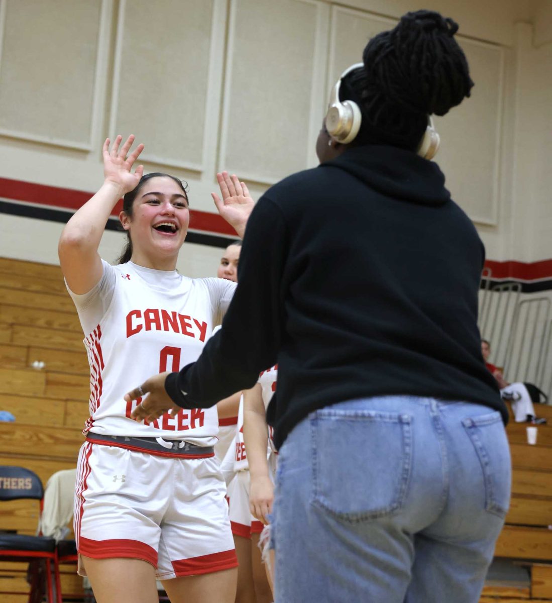 TRUSTED STARTER. Senior Hannah Javadian does her introduction with ZiaYiah Bookman against Conroe on Jan. 9, 2026. Javadian has always been someone on the team that has the most energy and brings a lot to the team every year. “Being a starter makes me feel proud because it means my coaches trust me, and I just want to go out there and give my team everything I've got,” Javadian said. 