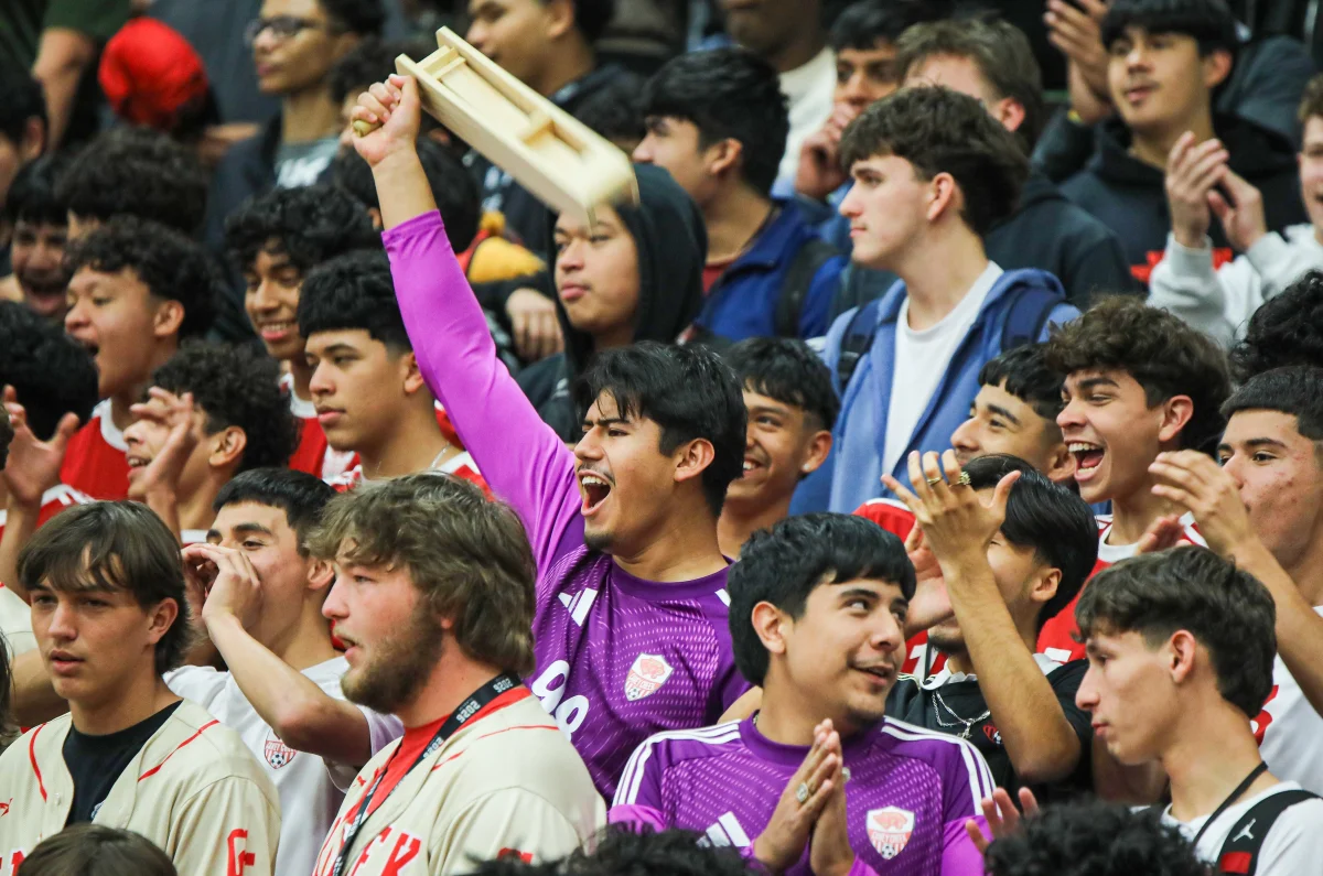 SPIRIT. Senior Aaron Ramirez swings a ‘matraca’ when speakers asked the boys to show spirit during the winter sports pep rally on Thursday, Feb. 5, 2026. This was the first pep rally where boys and girls were divided on the bleachers and competed against each other to show who had more spirit.