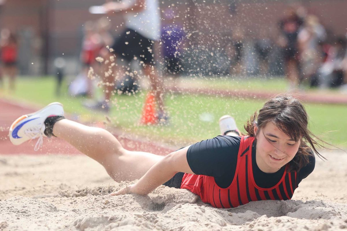 FALLING DOWN. Junior Caitlyn Rhodes was triple jumping on Thursday March 6, 2026. Rhodes would go up for her jump and land but every time she would trip over herself. 