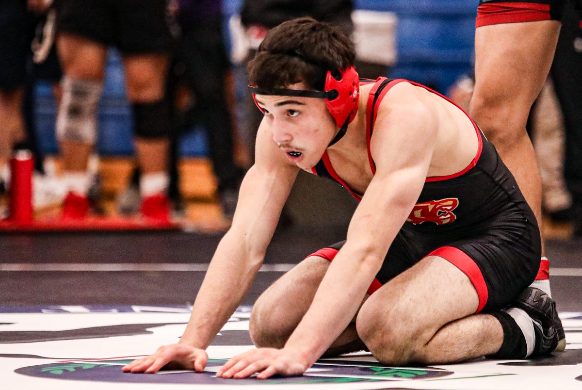 Sophomore Julien Ndebi prepares for a match at the Westside Chicken Wing Invitational Jan. 10, 2026.